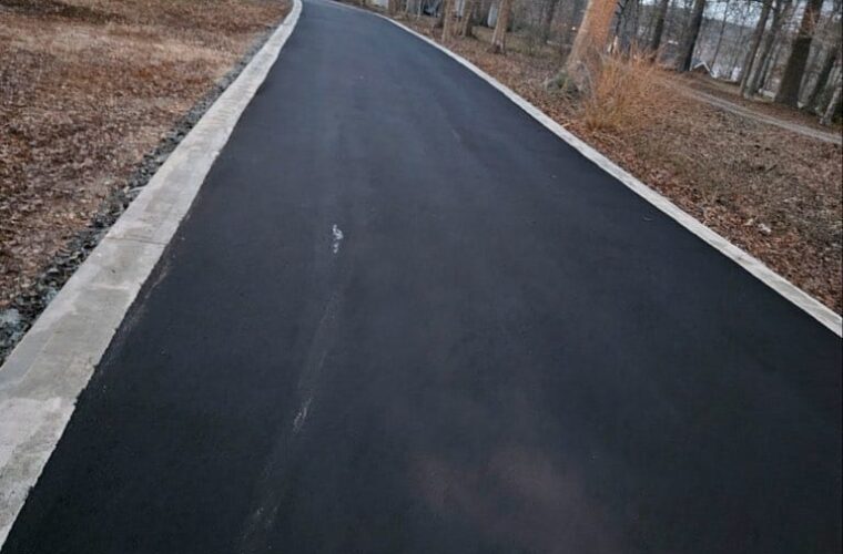 photo of newly paved asphalt residential driveway