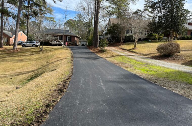 photo of newly paved asphalt residential driveway